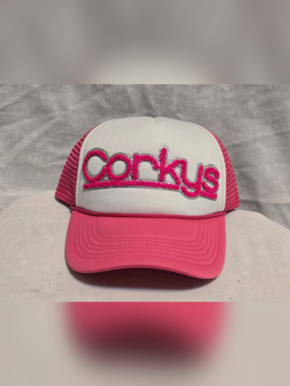 Corkys Pink and White Logo Truckers Hat